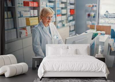 Pharmacy Drugstore Checkout Counter Cashier: Portrait of Experienced Caucasian Female Pharmacist Using Personal Computer, to Check Stock Inventory of Medicine, Drugs, Vitamins, Health Care Product Wall mural