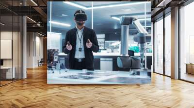 Portrait of a Young Specialist Using a Virtual Reality Headset with Controllers to Operate an Experimental Robotic Arm Machine. High Tech Industrial Laboratory Facility. Wall mural