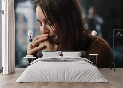 Portrait of Sad Crying Woman being Harrased and Bullied by Her Partner. Couple Arguing and Fighting Violently. Domestic Violence and Emotional Abuse. Rack Focus with Boyfriend Screaming in Background Wall mural