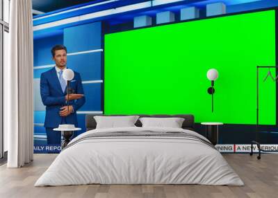 Talk Show TV Program: Handsome White Male Presenter Standing in Newsroom Studio, Uses Big Green Chroma Key Screen. News Achor, Presenter Talks About News, Weather. Mock-up of Cable Channel Wall mural