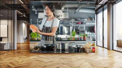 TV Cooking Show Kitchen: Asian Female Chef Talks about Ingredients, Teaches How to Cook Fish. Online Video Courses, Television Program. Healthy Traditional Dish Recipe Preparation Wall mural