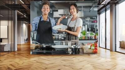 TV Cooking Show Kitchen with Two Master Chefs. Asian and Black Female Hosts Talk. Professionals Teach How to Cook Food, Taste Delicious Dish. Online Video Class Courses. Healthy Dish Recipe Prepare Wall mural