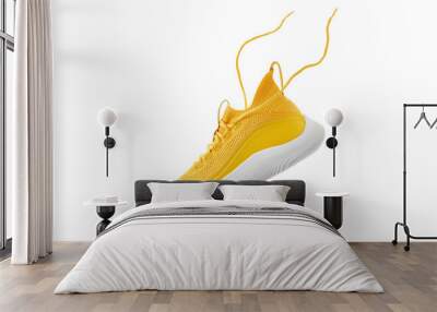 Flying yellow leather womens sneakers isolated on white background. Fashionable stylish sports casual shoes. Creative minimalistic layout with footwear. Mock up for design advertising for shoe store Wall mural