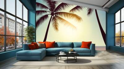 Summer background with beach and silhouettes of palm trees, evening coast, sand, sky and sun. Wall mural