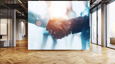 Business leaders forming strategic partnerships with a handshake, symbolizing collaboration and mutual success with a digital network overlay in the background.

 Wall mural