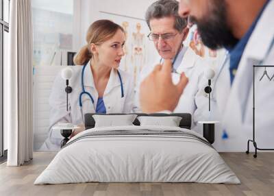 Busy doctors examining the medical record Wall mural