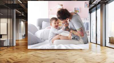 Close up of mother playing with baby Wall mural