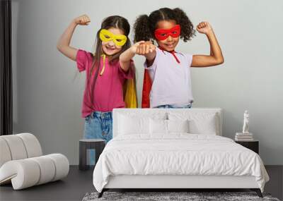 Two girls in superhero costume Wall mural