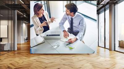 Business people, collaboration and strategy for finance with laptop in office from above with data analysis and graphs. Auditing team, financial discussion and meeting on company investment and sales Wall mural