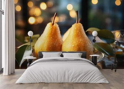 Two puffed golden pears on a white plate with leaves. Golden puffs are glued to the surface of the pears. Wall mural