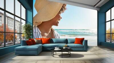 Black woman, smile and beach on summer vacation, holiday or getaway relaxing and enjoying the warm sunny day. Happy female smiling in joy for freedom sunshine, water and travel in relax by the ocean Wall mural