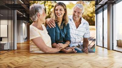 Family, senior parents and woman by pool holding with care, love and hug bonding outdoor. Smile, happy person and people in retirement with adult daughter together with bokeh in nature in summer Wall mural