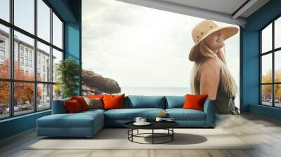 Lifes brighter out here. an attractive young woman spending a day at the lake. Wall mural