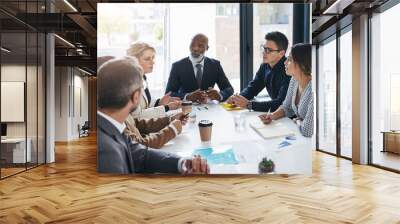 Meeting, team and business people in discussion in the office planning a corporate strategy together. Diversity, teamwork and professional employees working in collaboration on a project in workplace Wall mural