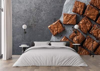 Chocolate brownie on paper on dark grey base text space on left Wall mural