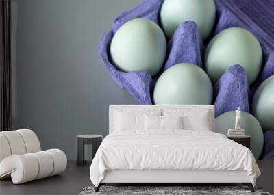 Eggs in paper carton six white on grey table Wall mural