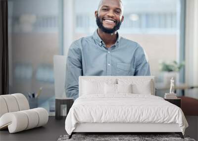 Confidence, success and portrait of a businessman in the office with leadership and vision. Happy, smile and professional African male hr manager sitting with a positive mindset in the workplace. Wall mural