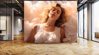 Beautiful happy woman lies in soft bedding and feels like on clouds in sky Wall mural