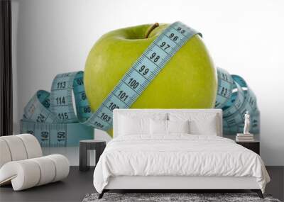 green apple with a blue measure tape Wall mural