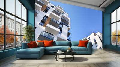 Modern and new apartment building. Multistoried, modern, new and stylish living block of flats. Wall mural