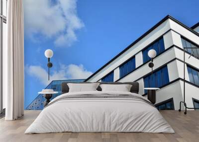 modern building with blue sky and clouds Wall mural