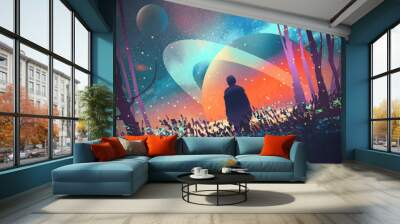 man standing alone in forest with fictional planets background,illustration Wall mural