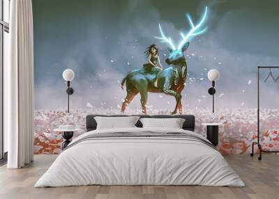 The young girl sitting on her magic stag with the glowing horns, digital art style, illustration painting Wall mural