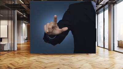 businessman pointing to something or touching a touch screen on Wall mural