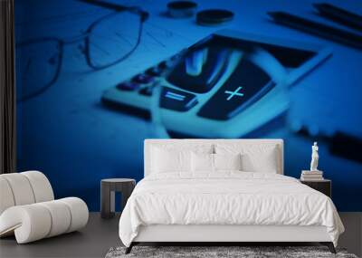 Calculator button plus and magnifying glass on graph paper backg Wall mural