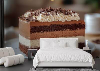 A slice of chocolate cake with whipped cream and chocolate chips on top Wall mural