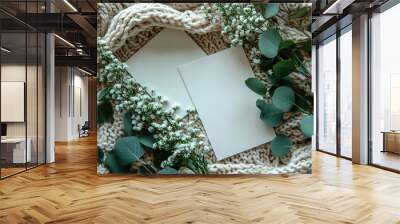 Two white cards with a green leaf in the middle Wall mural