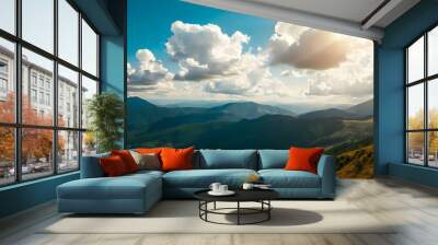 Imagine a summer day in the mountains with fluffy white cumulus clouds dotting the bright blue sky, casting playful shadows on the lush green valleys below 2 Wall mural