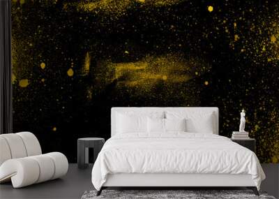 grunge abstract texture gold splash background. black background on gold paint splash brush Wall mural