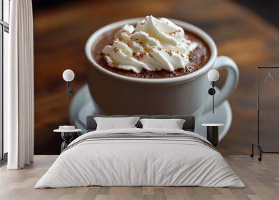 Delicious hot chocolate topped with whipped cream served in a cozy café during winter season Wall mural