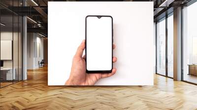 holding a phone on a white background Wall mural