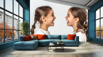 Two girl face in opposit direction, Laughing girl vs Crying girl Wall mural