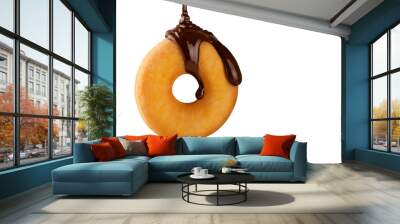 Hot melted chocolate falling fluidly on a delicious donut isolated on white background. Creative pastry. Concept of delicious and fast desserts. Wall mural