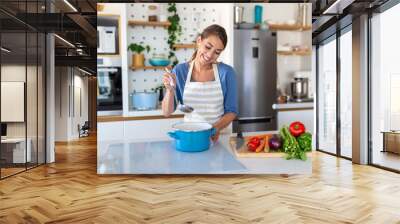 Beautiful young woman stand at modern kitchen chop vegetables prepare fresh vegetable salad for dinner or lunch, young woman cooking at home make breakfast follow healthy diet, vegetarian concept Wall mural