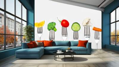 Fruit and vegetable of silver forks against a white background concept for healthy eating, dieting and antioxidant Wall mural