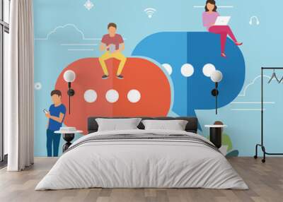 Speech bubbles for comment anf reply concept flat vector illustration of young people using mobile smartphone for texting and leaving comments in social networks. Guys and women sitting on big symbols Wall mural