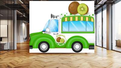 A green vehicle selling kiwi fruits Wall mural