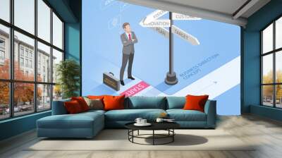 Business people concepts. Businessman standing at a crossroad and looking directional signs arrows. Isometric vector illustration. Wall mural