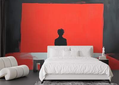 A contemplative figure sits silently before a vibrant red background, evoking feelings of introspection and emotional depth. Wall mural