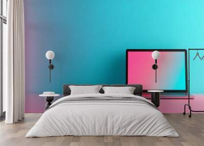 A vibrant scene featuring a modern laptop against a colorful gradient backdrop, perfect for tech and design themes. Wall mural