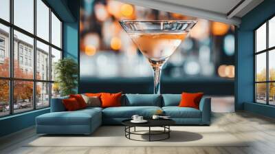 Elegant cocktail in a glass on a stylish bar counter. Wall mural