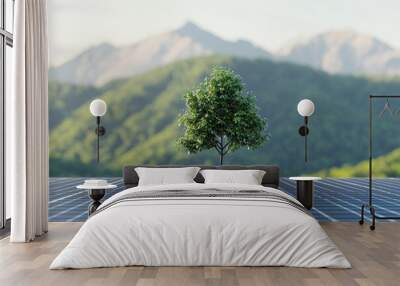 Tree on solar panels with mountains in the background, nature and technology combined. Wall mural