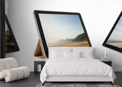 Electronic tablet with landscape on screen isolated on transparent background Wall mural