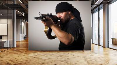 man with gun Wall mural