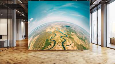 Aerial View Green Forest Woods And River Landscape In Sunny Spring Day. Top View Of Beautiful European Nature From High Attitude. Drone View. Bird's Eye View. Little Small Planet Concept Wall mural