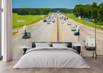 Busy Highway During Day. Heavy Traffic Moving At Speed On Motorw Wall mural